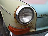 Rust on fender around headlight